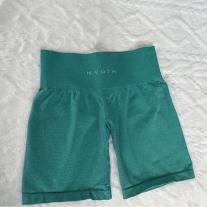 NVGTN turquoise pro shorts